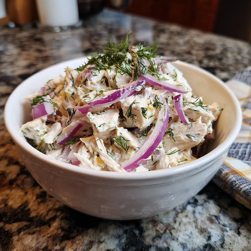  Poaching chicken in a Dutch oven with onions and garlic for dill chicken salad.